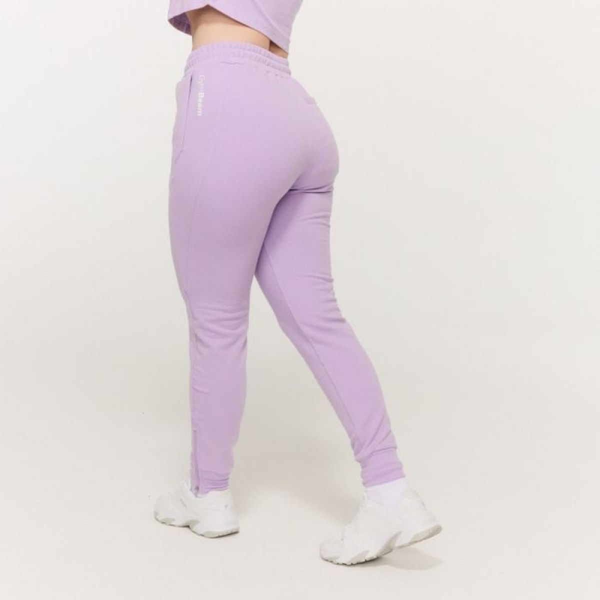 GymBeam Dámske tepláky Limitless Lavender MM · záber 1