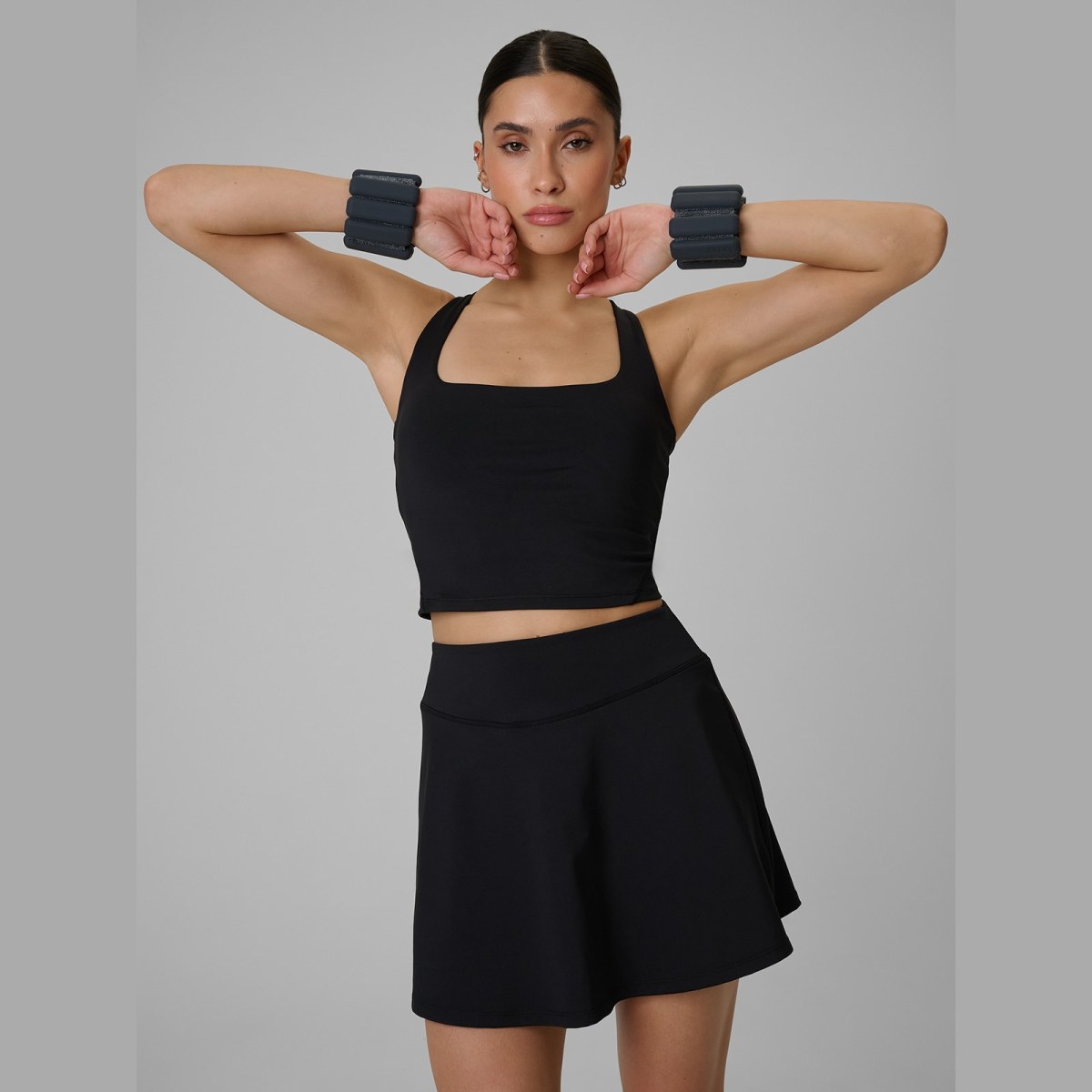 Crop top tréningový slim rýchloschnúci dámsky - čierny · záber 1