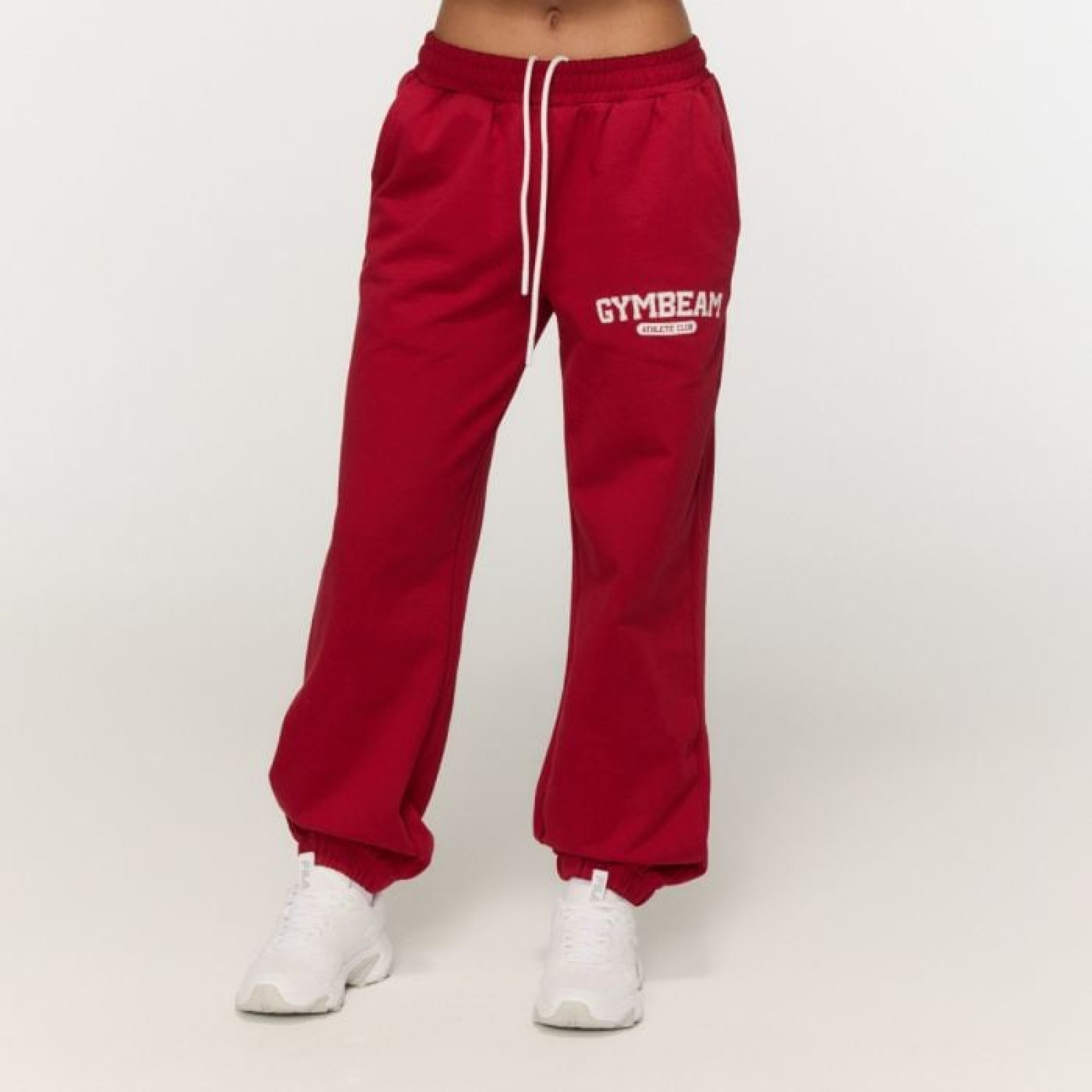 GymBeam Dámske tepláky Varsity Red M · záber 1