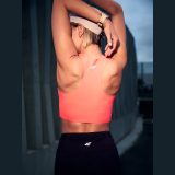 Dámsky rýchloschnúci crop top na behanie - oranžový · záber 1