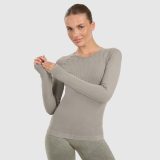 Dámsky rýchloschnúci slim longsleeve na jogu a pilates - zelený · záber 1