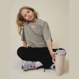 T-shirt loose s potlačou dievčenský - béžový · záber 1