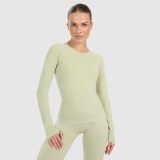 Dámsky slim rýchloschnúci longsleeve na jogu a pilates - zelený · záber 1