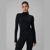 Tréningový longsleeve slim rýchloschnúci dámsky - čierny · záber 1